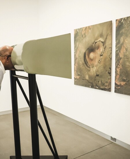person looking at art