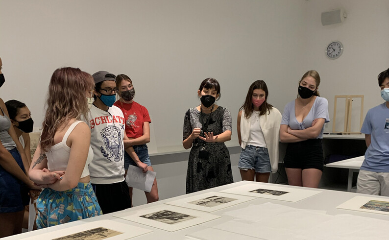 Class meeting with artworks