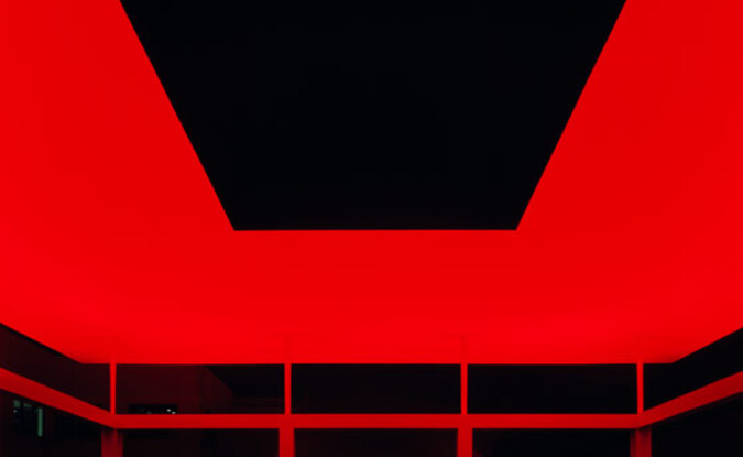 Nighttime view of the James Turrell Skyspace with red lighting