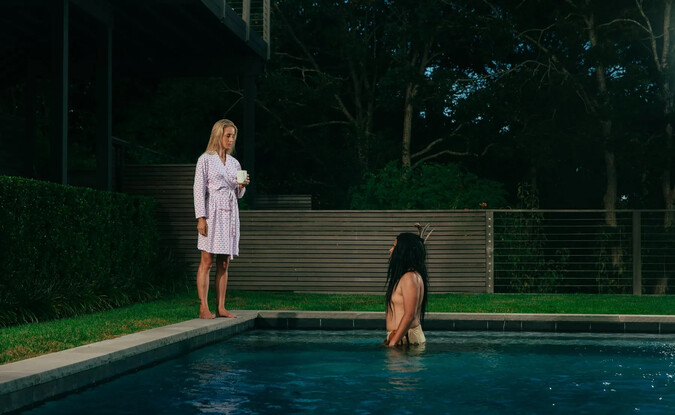 emerging person from pool