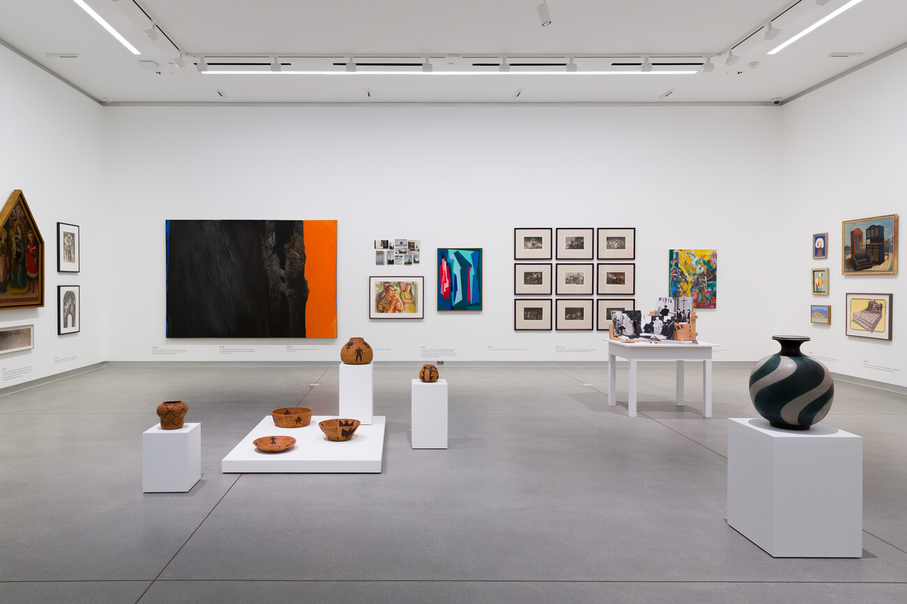 Works of art on pedestals and installed on gallery walls