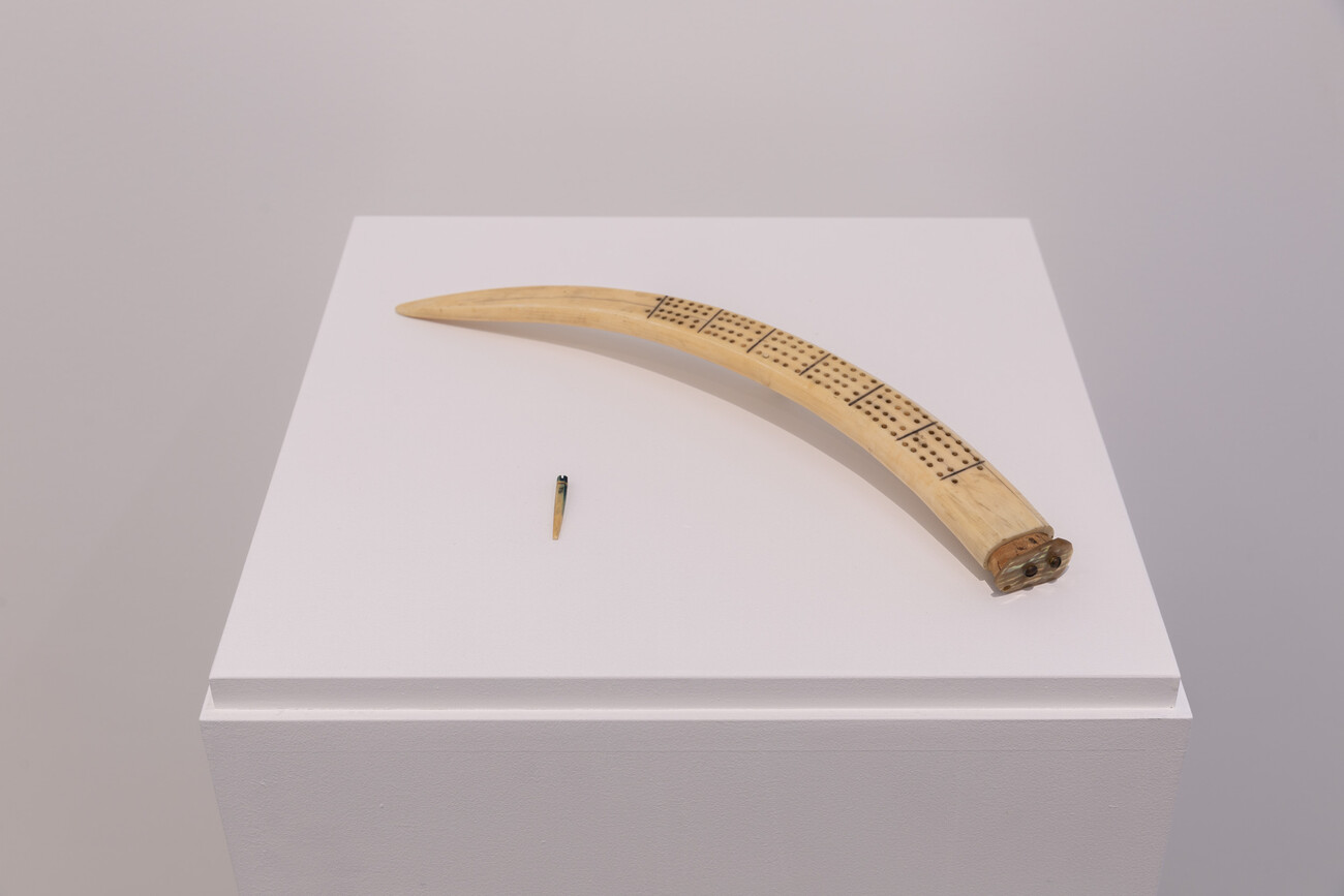 Cribbage board on pedestal in gallery