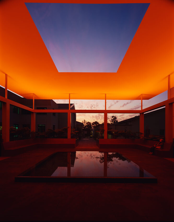 Nighttime view of the James Turrell Skyspace with red-orange lighting