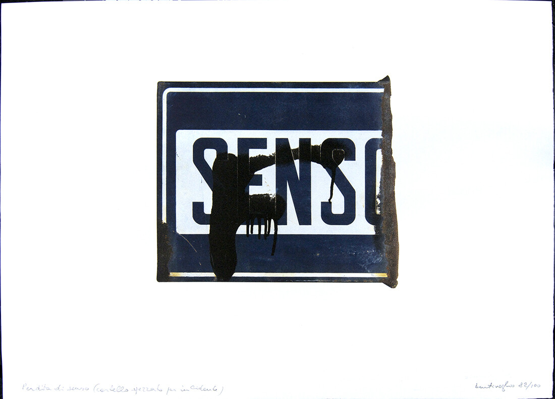 Cut off graphic with letters SENSO in blue and white with spray paint overlay