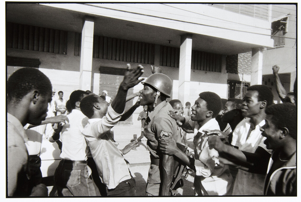 Danny Lyons, The soldier is greeted as hero. February 7, Port-au-Prince, 1983-86, Silver gelatin print, 8 1/2 x 13 in.