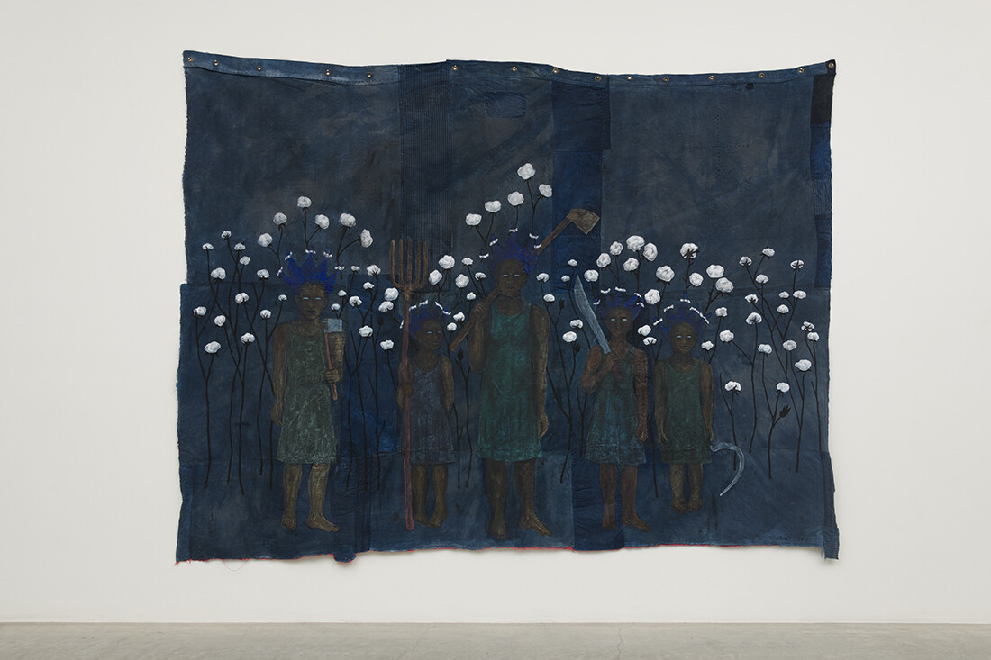painting on indigo dyed material with multiple figures