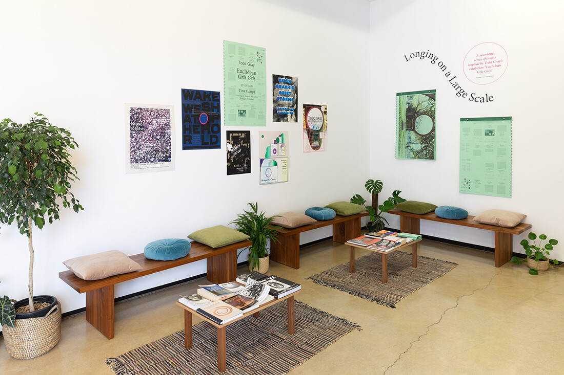 Reading area with green posters book and plants
