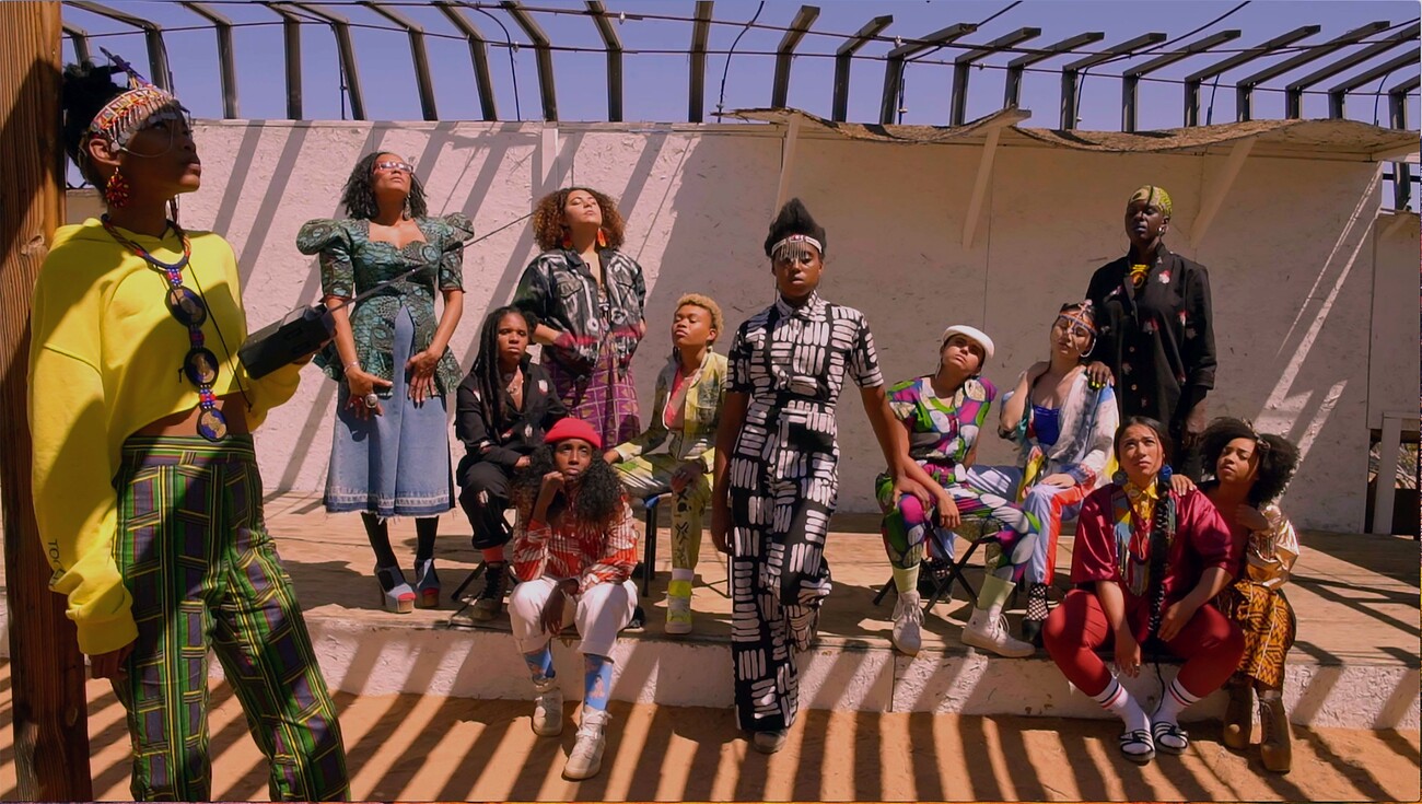 group of women wearing colorful clothing