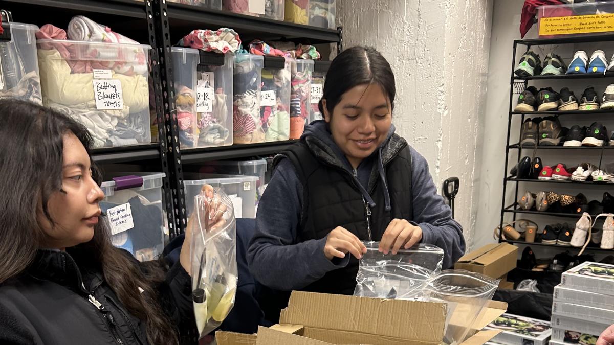 Students pack bags of toiletries