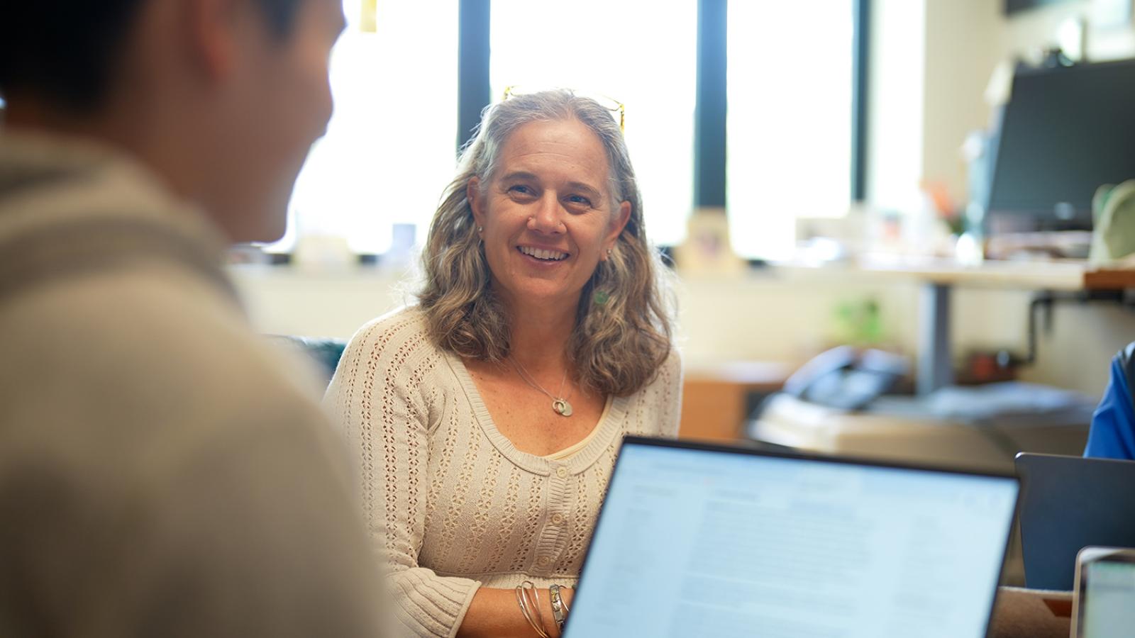 Professor Jo Hardin talking with a student