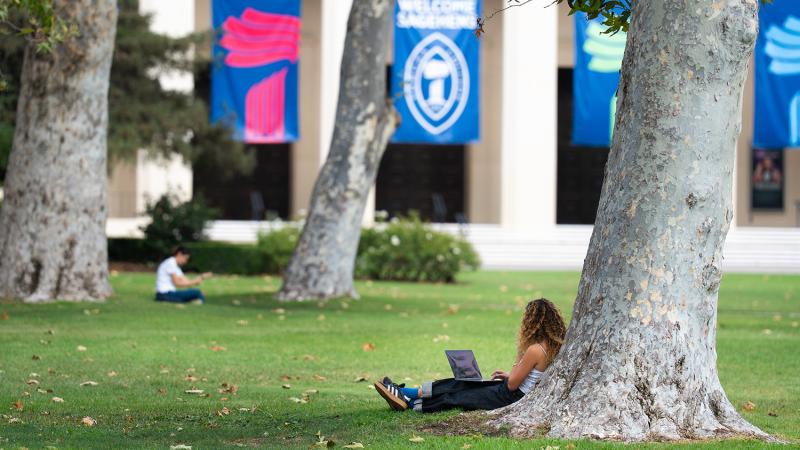 students sitting on marston quad