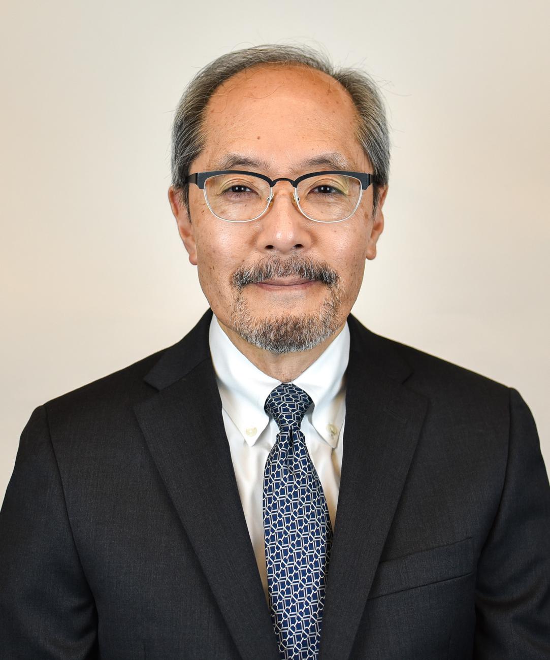 photo of verne naito class of 1977 distinguished service alumni award winner