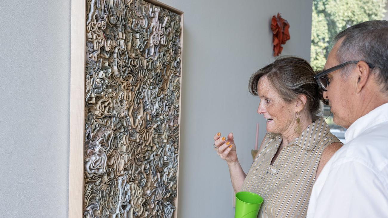 Gallery talk attendees view Jessica Drenk's work.