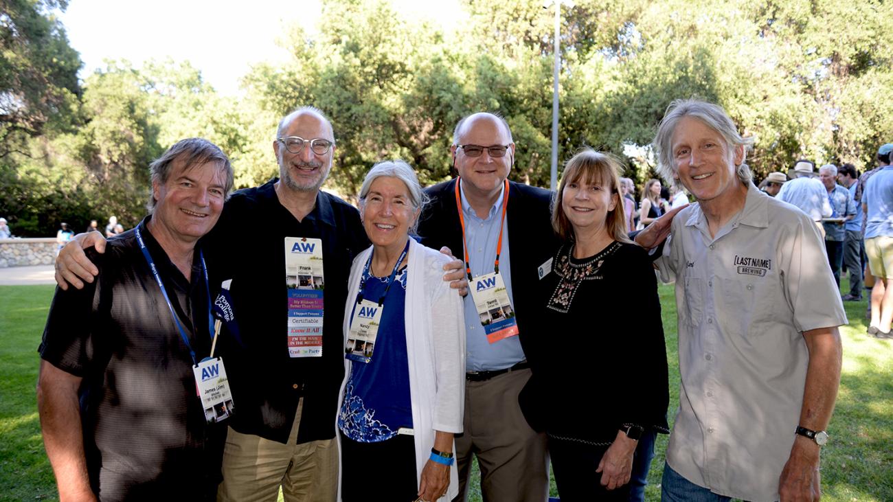 photo of Frank Albinder with alumni friends on Pomona's campus