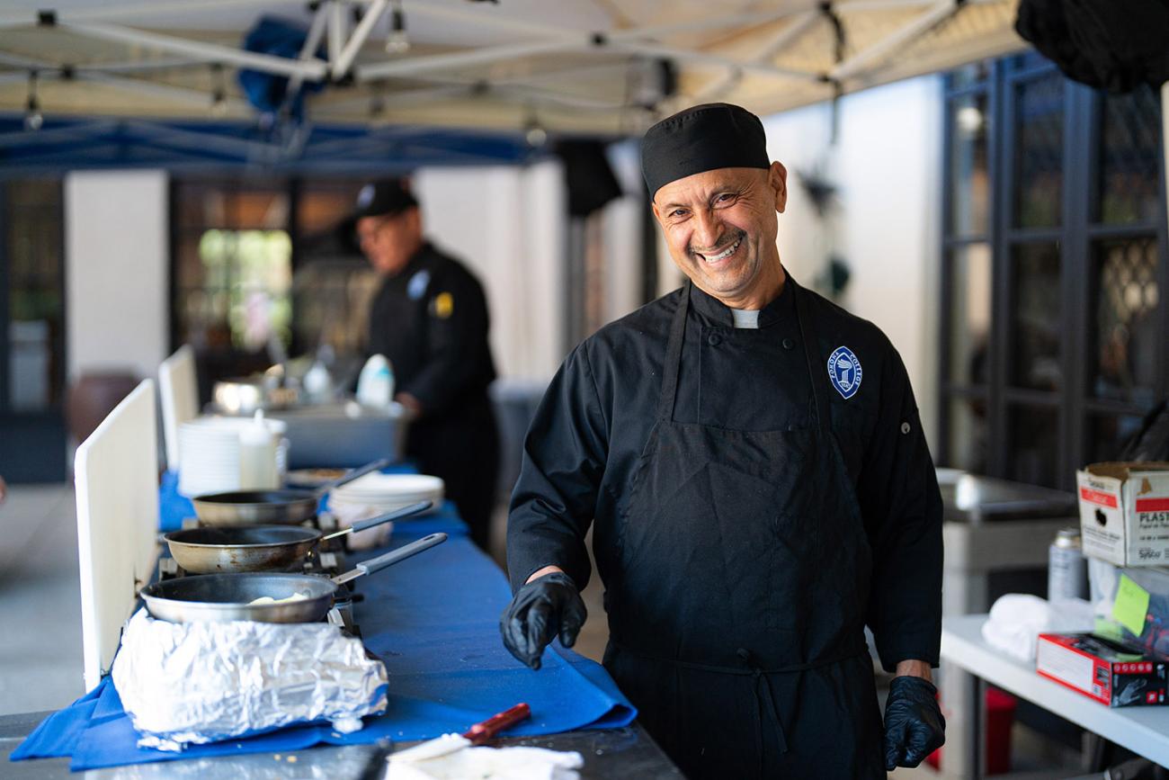 Teo poses for photo at omelette station 