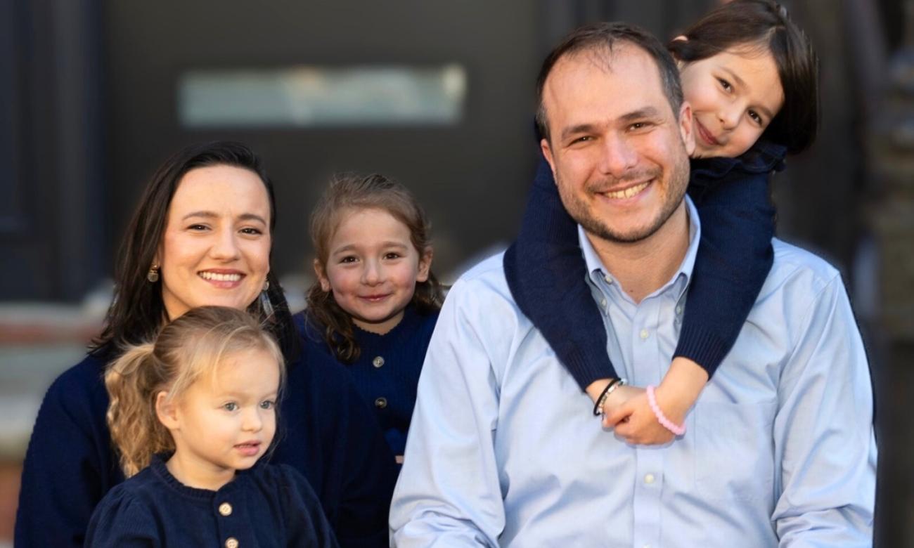 James Solomon with his wife and three young daughters