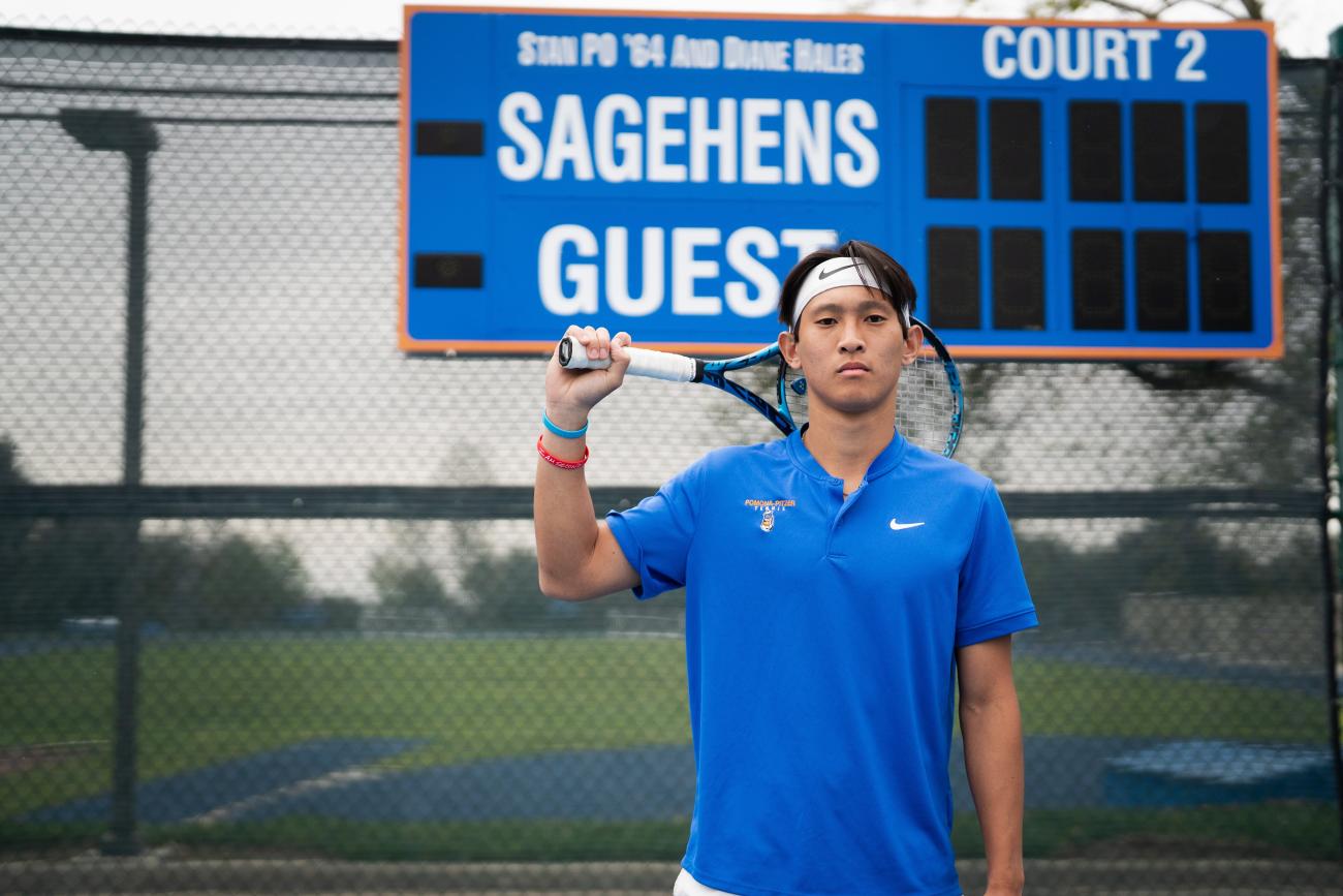 Ethan Lee poses on the tennis court