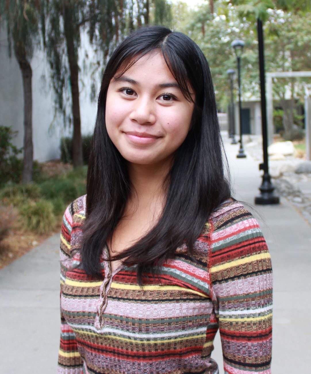 Julia Aceron outside on campus
