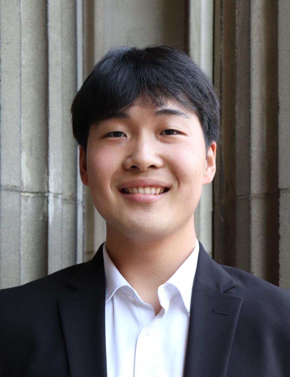 Jun Kwon '28 outside by a building