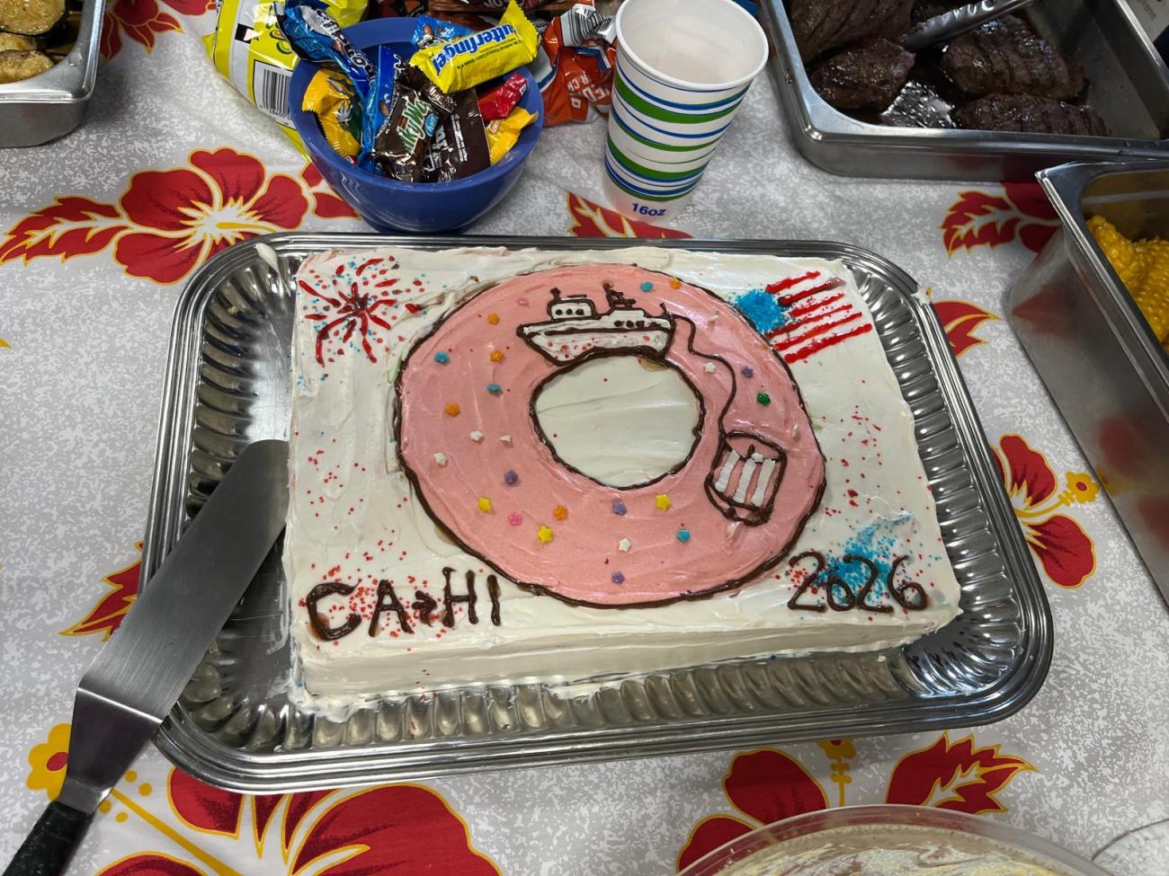 cake decorated with DONUT logo