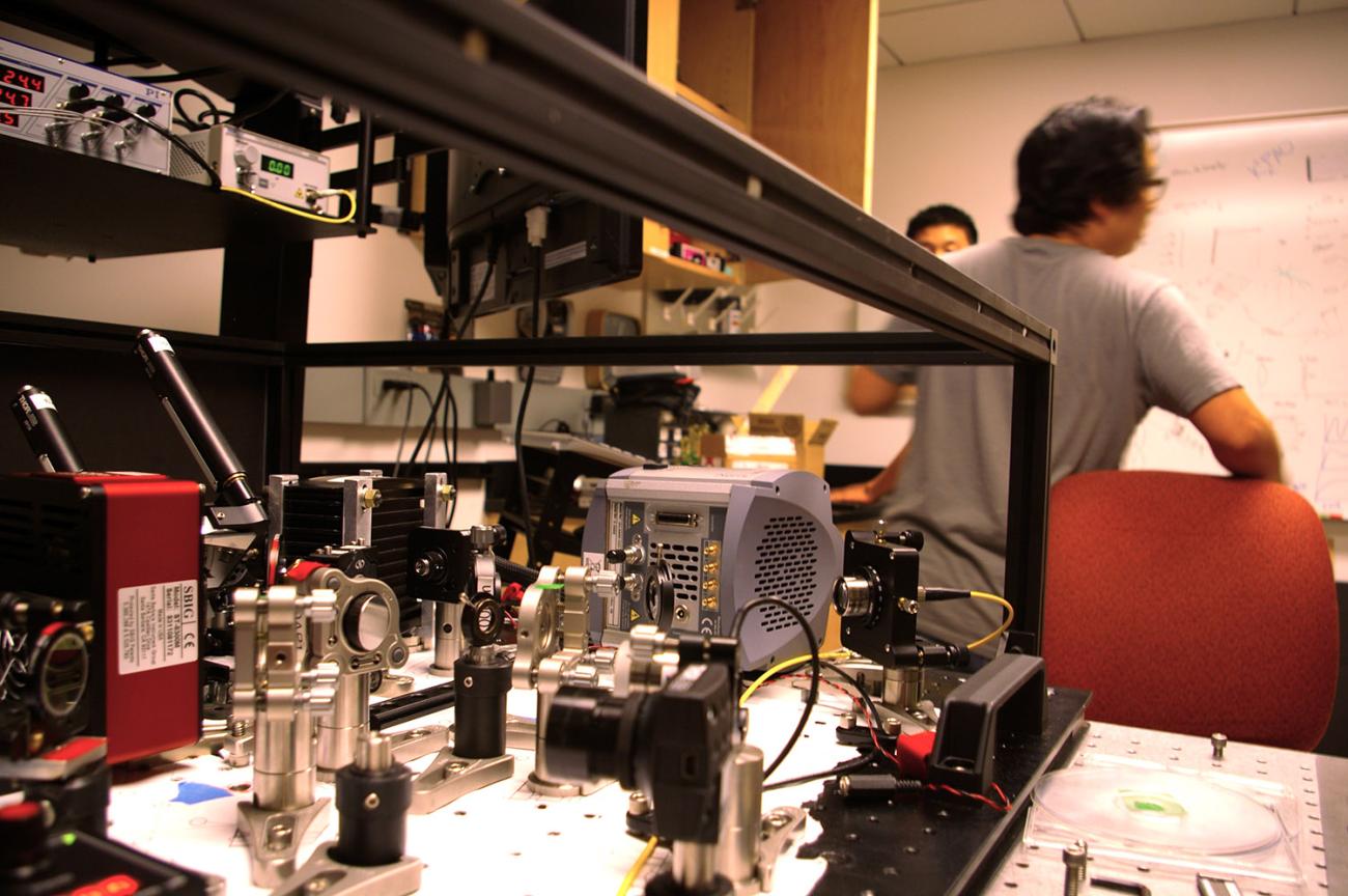 Adaptive Optics lab with faculty member and student