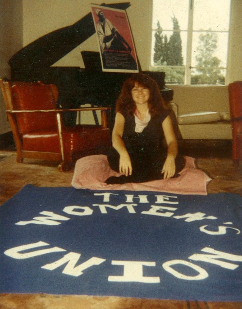 Colleen O'Neil with Women's Union banner