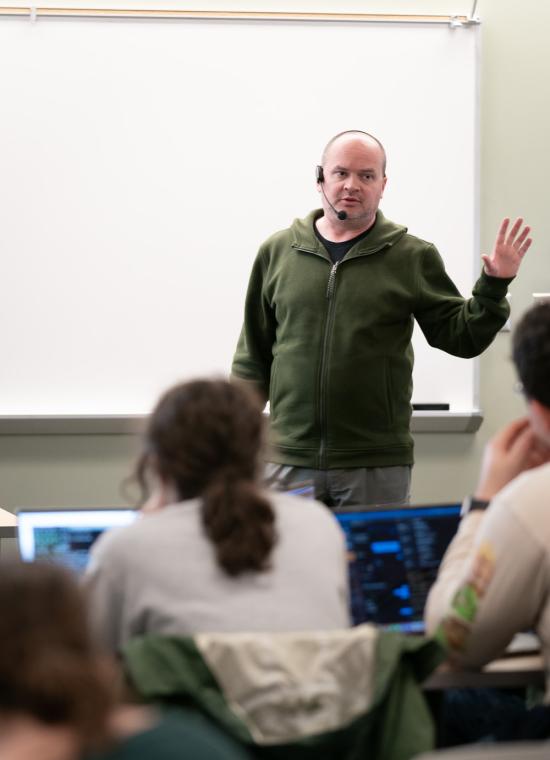 Mikey Dickerson '01 teaching a computer science class