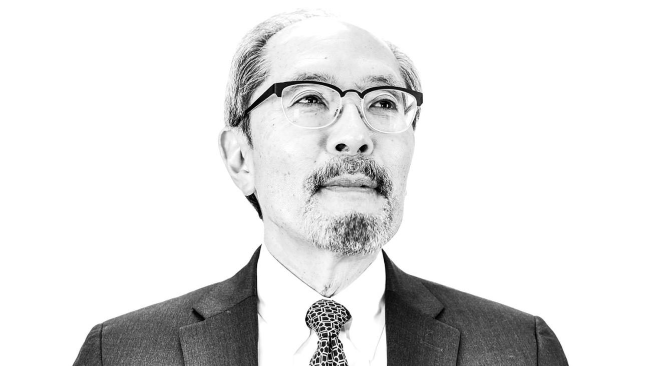 black and white photo of alumnus verne naito class of 1977