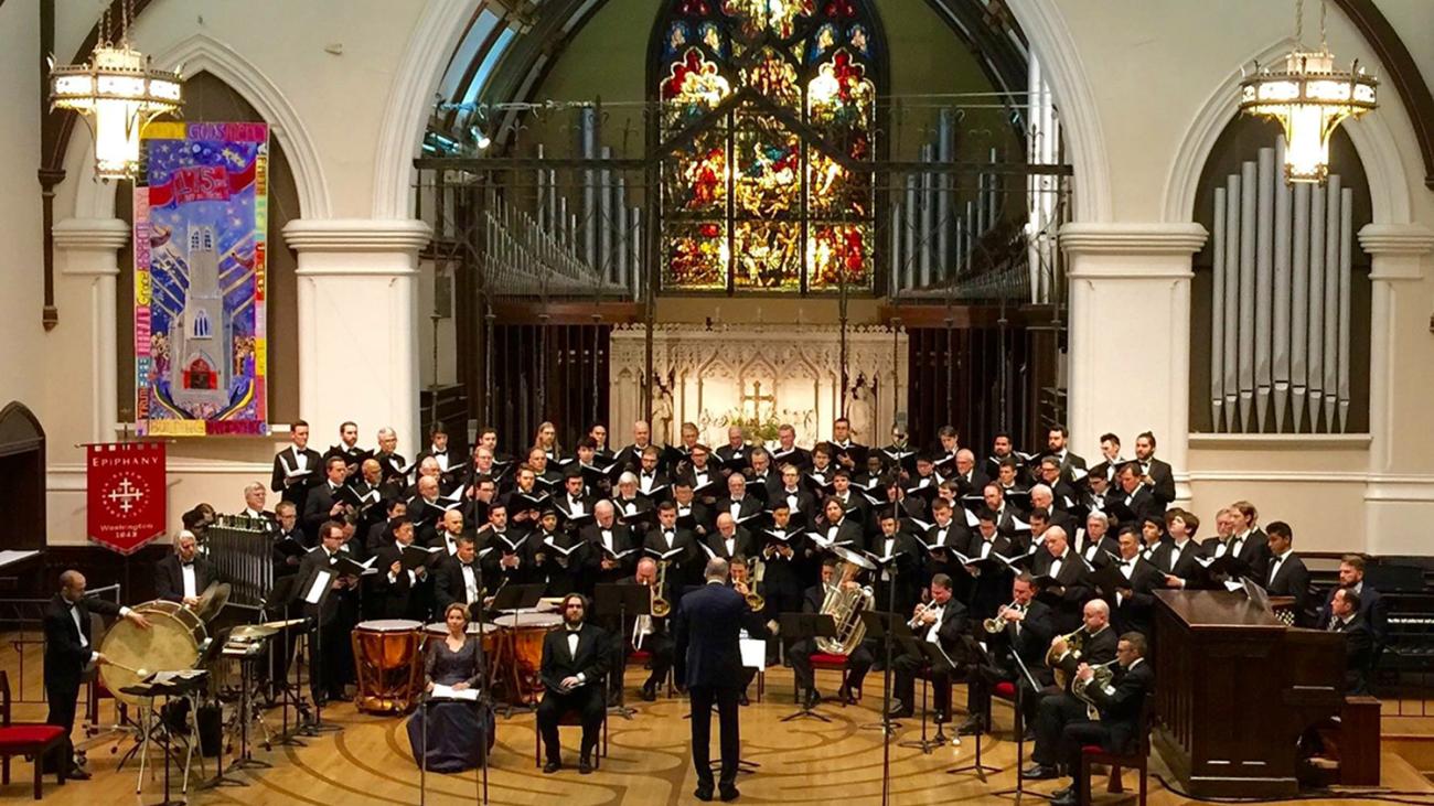 photo of a choir performing in a chapel