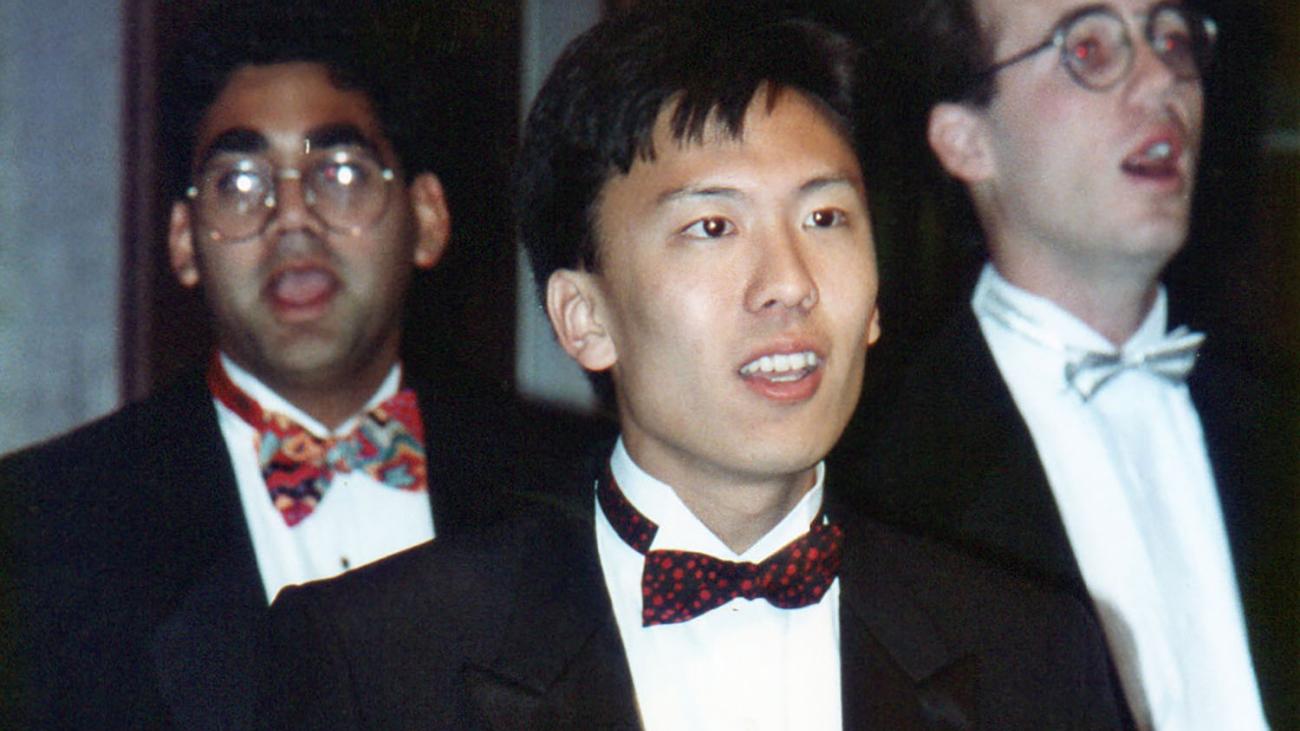Tyler Hokama as a student singing in the Blue and White acapella group