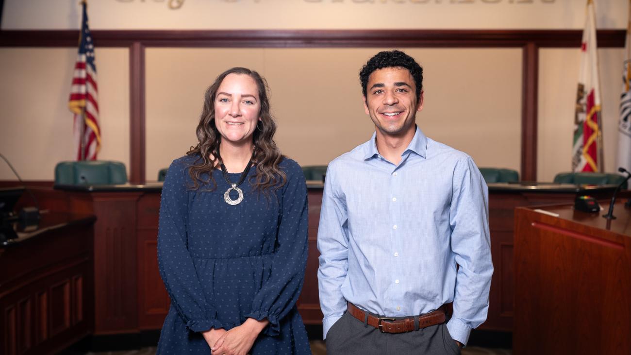 Claremont Deputy City Manager Katie Want stands with Josh Crowley '27 inside Claremont City Hall