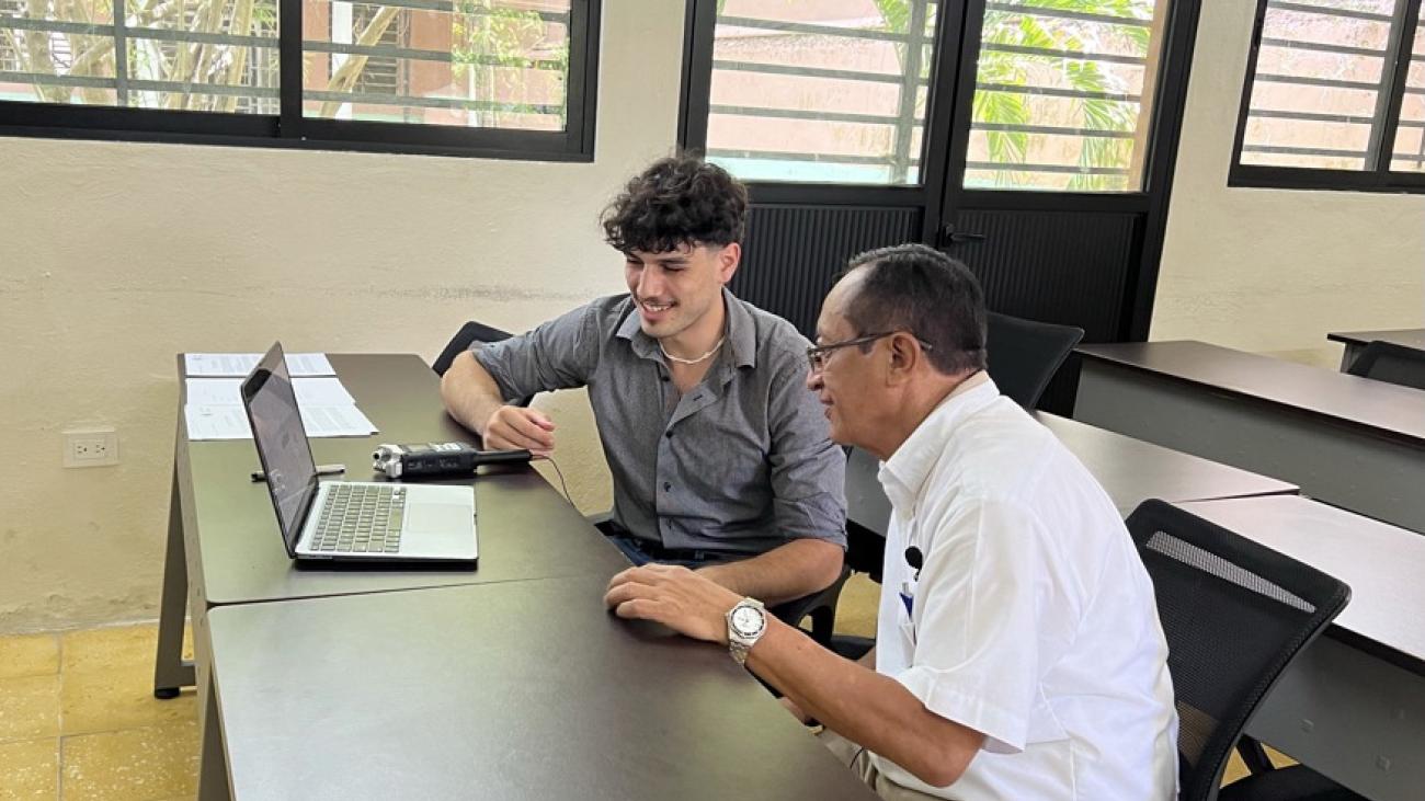 Erubey Lopez ’25 and professor