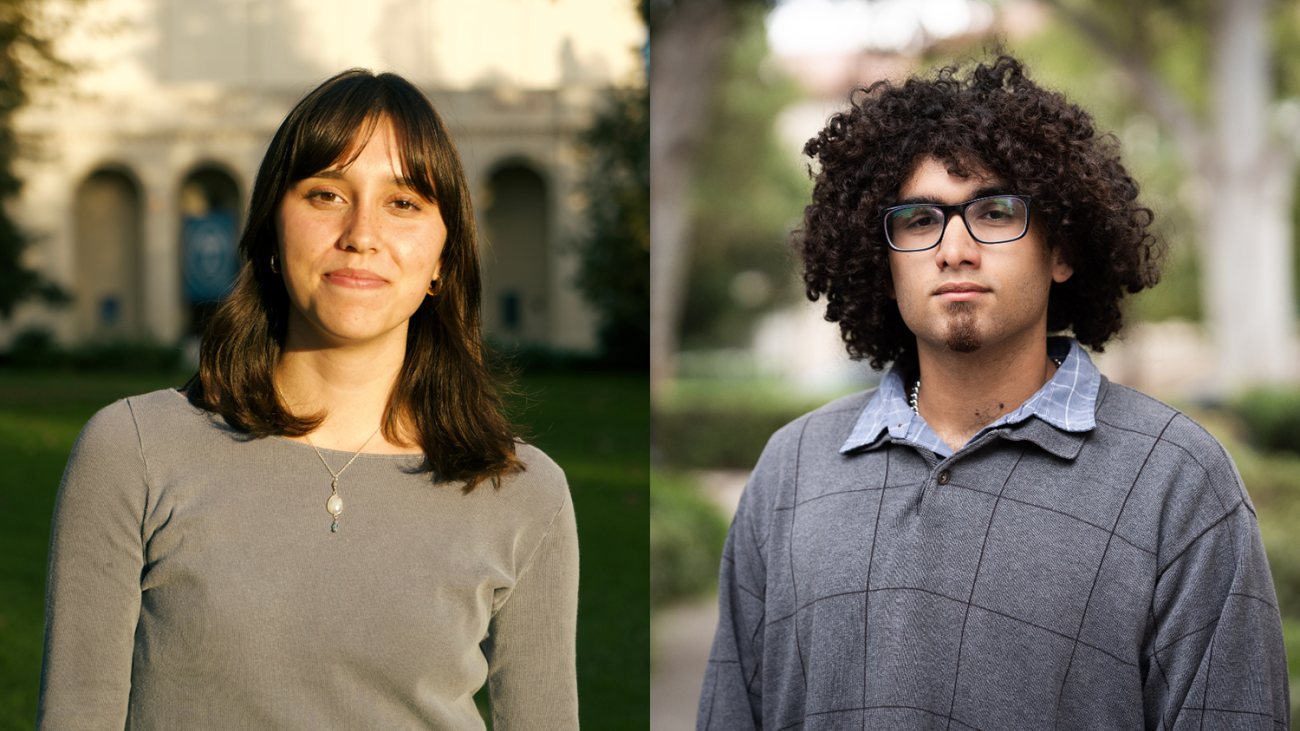 Two students pose for a photo on campus. 